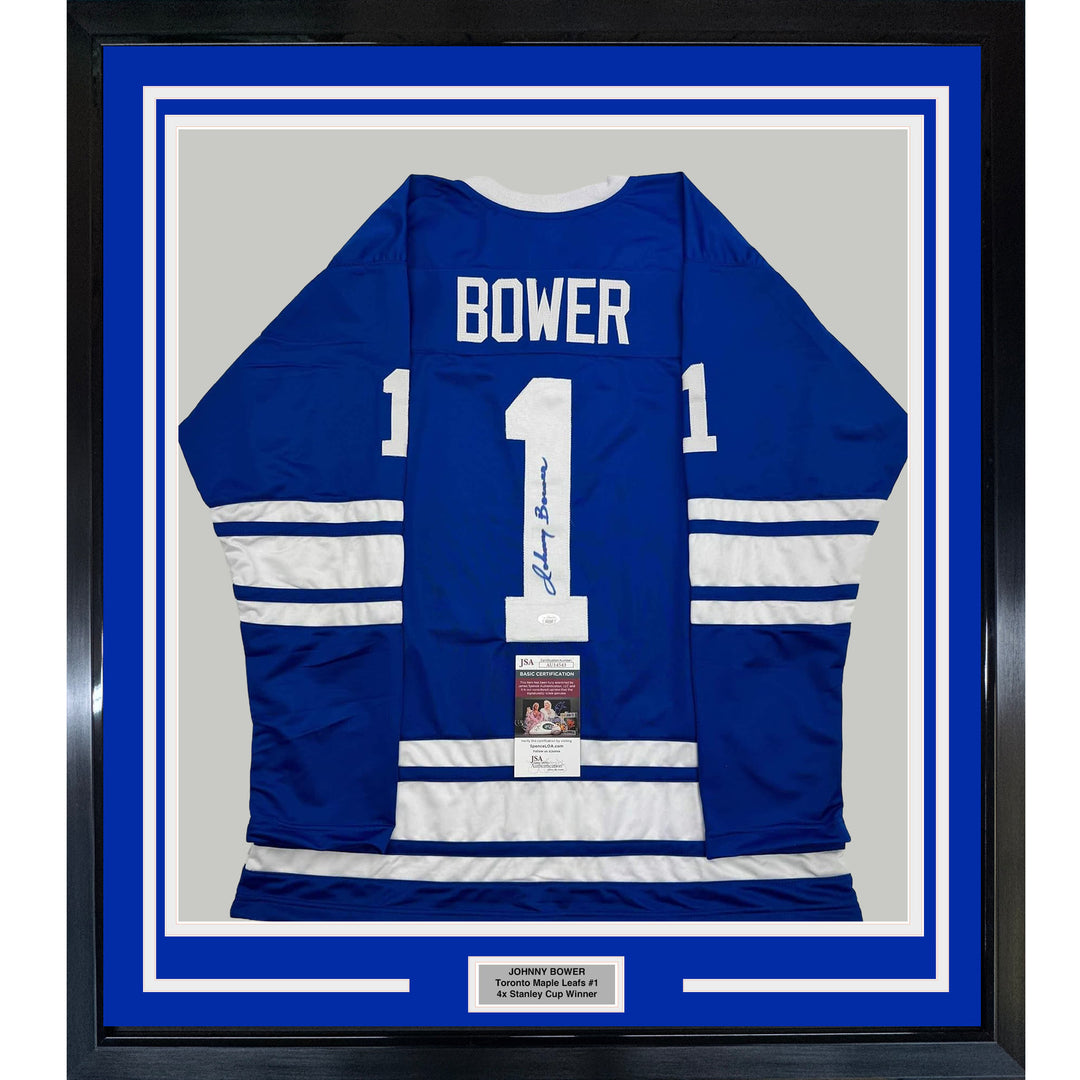 Framed Autographed/Signed Johnny Bower 35x39 Toronto Blue Hockey Jersey JSA COA