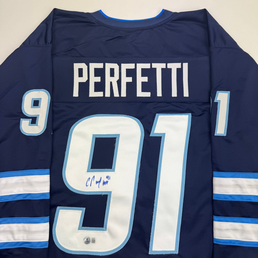 Autographed/Signed Cole Perfetti Winnipeg Blue Hockey Jersey Beckett COA