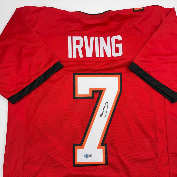 Autographed/Signed Bucky Irving Tampa Bay Red Jersey Beckett BAS COA