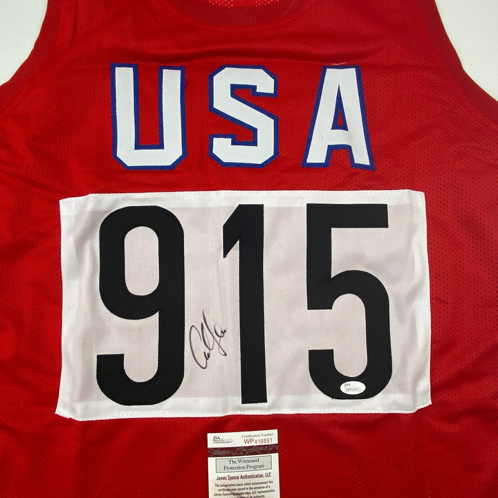 Autographed/Signed Carl Lewis Track United States USA Olympics Jersey JSA COA