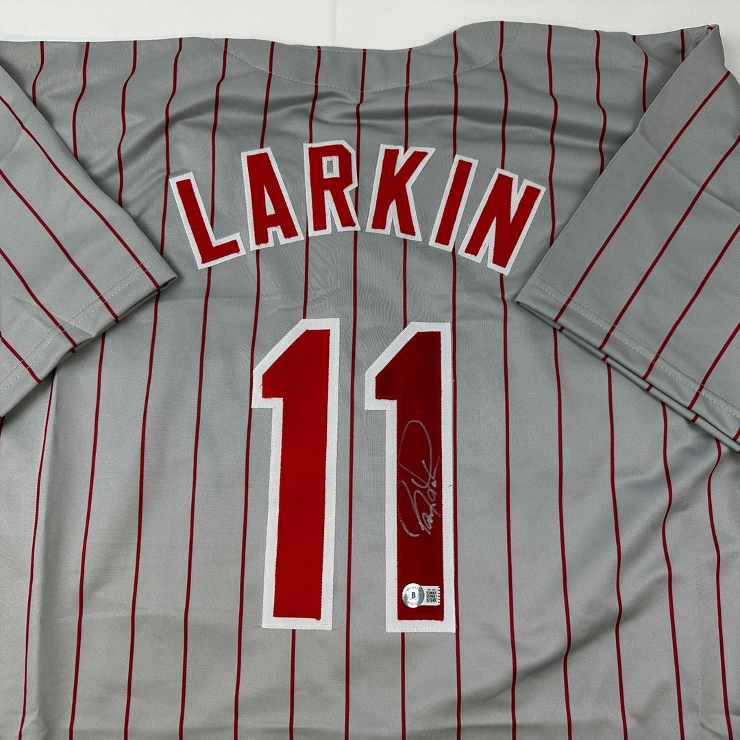 Autographed/Signed Barry Larkin Cincinnati Grey Pinstripe Jersey Becket