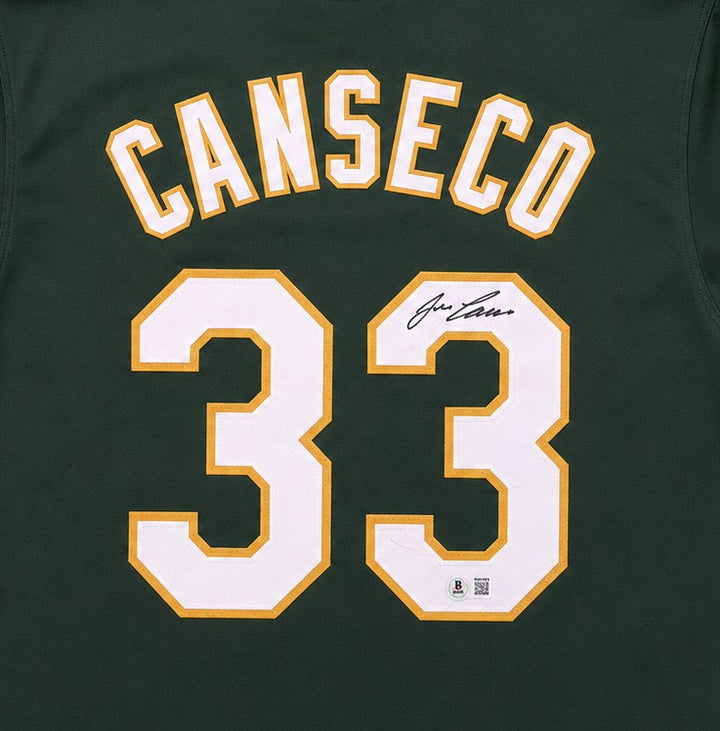 Oakland A's Jose Canseco Signed Green Jersey Beckett BAS Witness