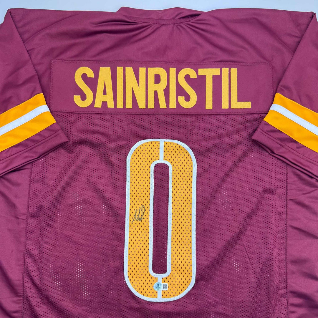 Autographed/Signed Mike Sainristil Washington Burgundy Jersey Beckett COA