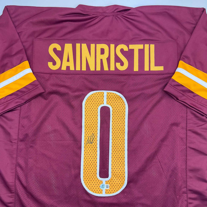 Autographed/Signed Mike Sainristil Washington Burgundy Jersey Beckett COA