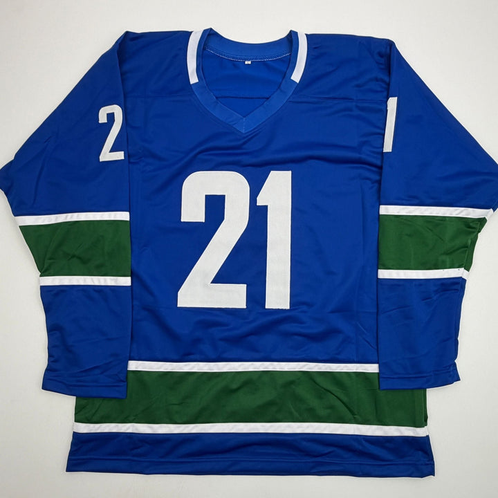 Autographed/Signed Nils Hoglander Vancouver Blue Hockey Jersey Beckett COA