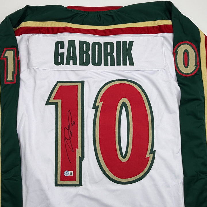 Autographed/Signed Marian Gaborik Minnesota White 25th An Jersey Beckett BAS COA