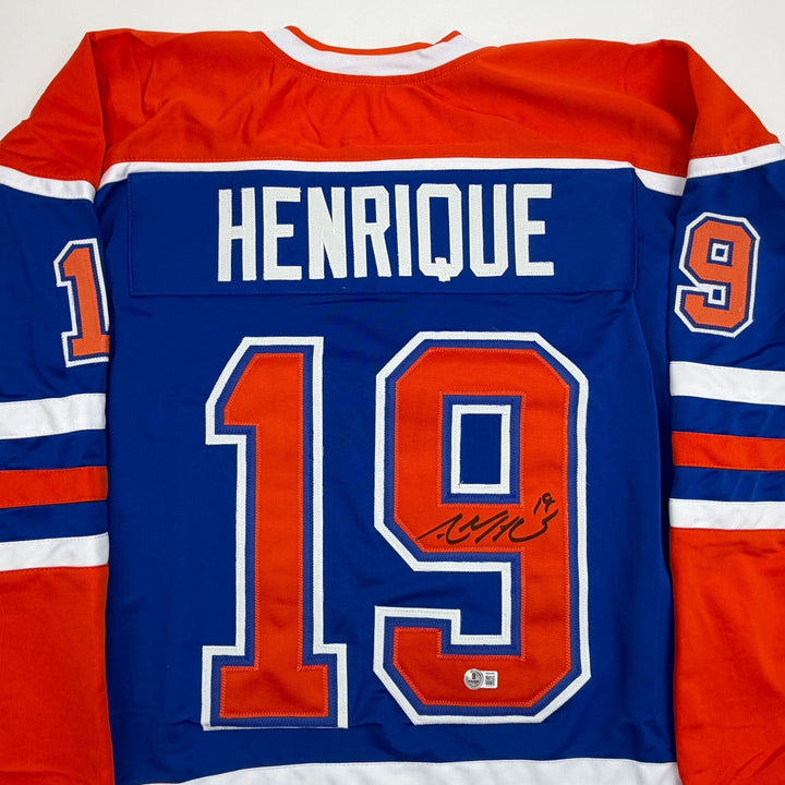 Autographed/Signed Adam Henrique Edmonton Blue Hockey Jersey Beckett COA