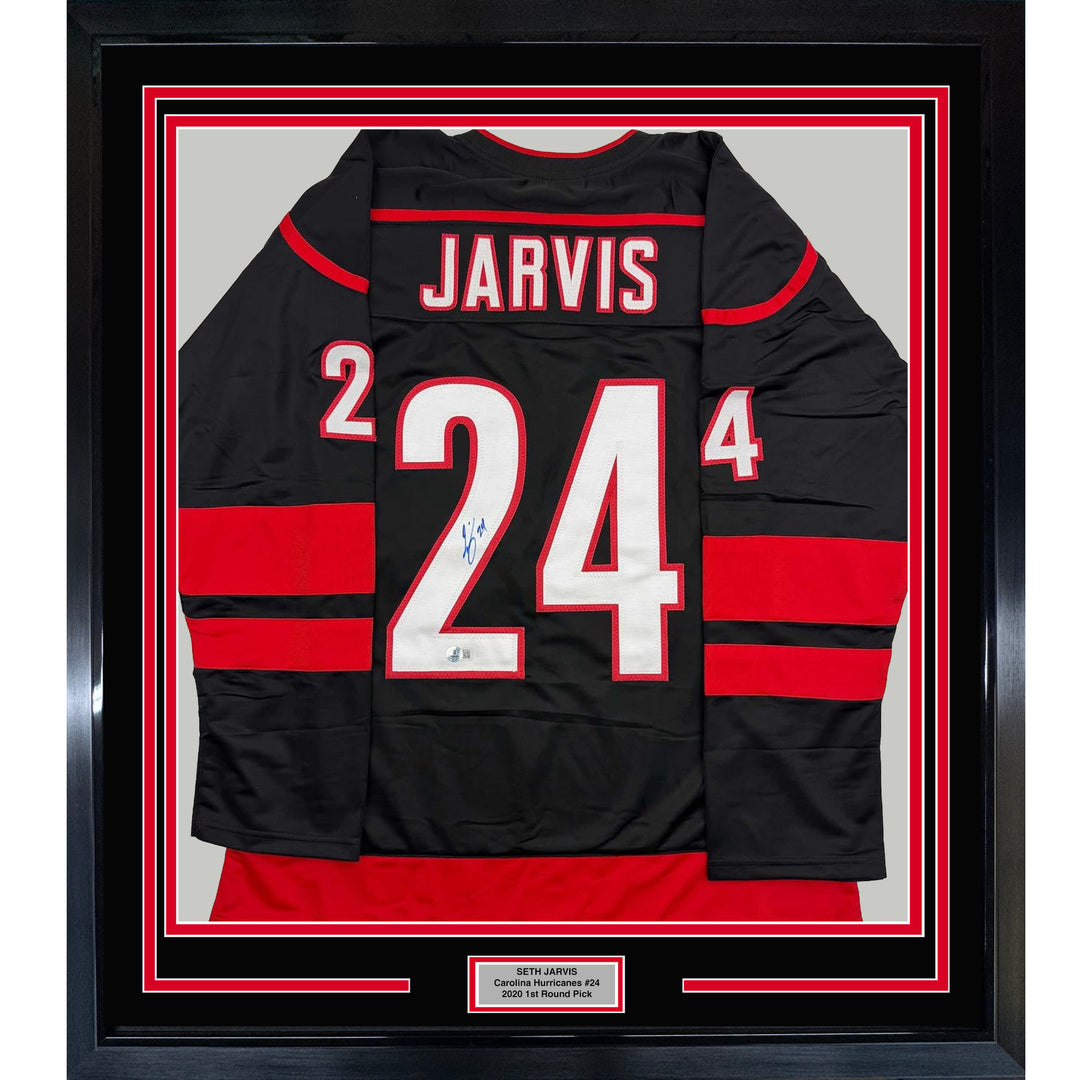 Framed Autographed/Signed Seth Jarvis 35x39 Carolina Black Hockey Jersey BAS COA