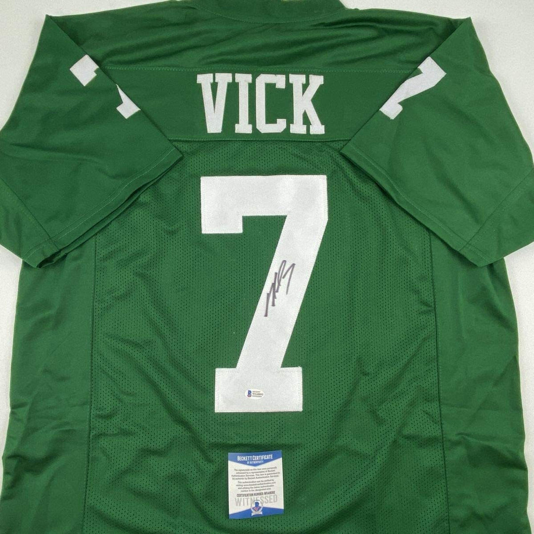 Autographed/Signed MICHAEL MIKE VICK Philadelphia Kelly Green Jersey Beckett COA