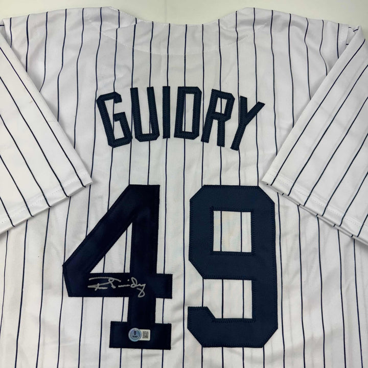 Autographed/Signed Ron Guidry New York Pinstripe Jersey Beckett BAS COA