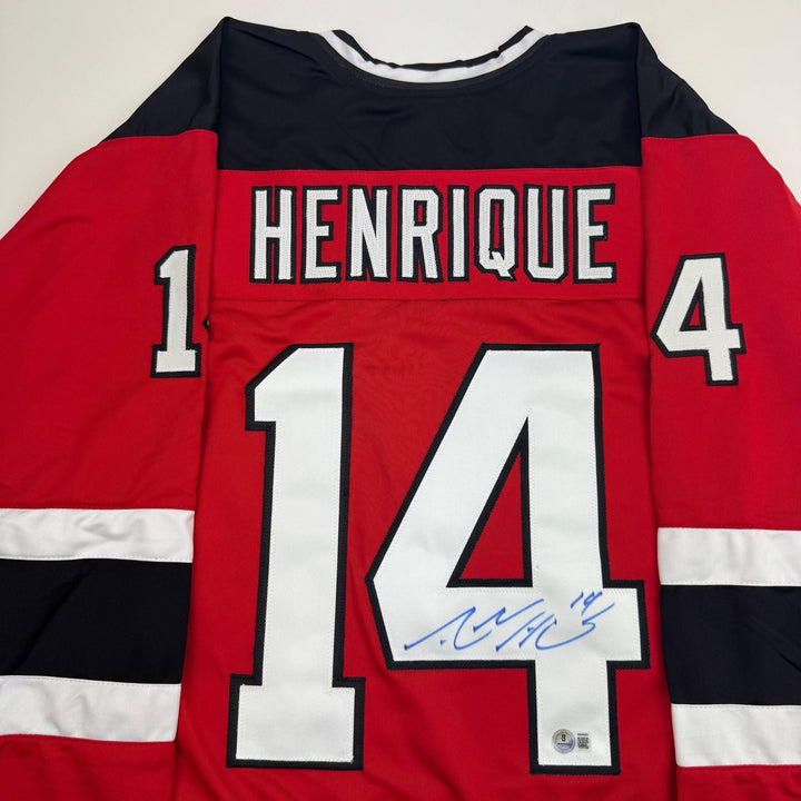 Autographed/Signed Adam Henrique New Jersey NJ Red Hockey Jersey BAS COA