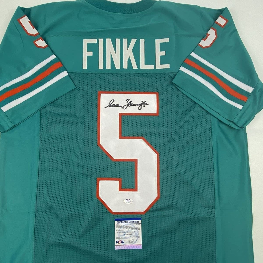 Signed SEAN YOUNG Ray Finkle Ace Ventura Miami Teal Jersey PSA COA