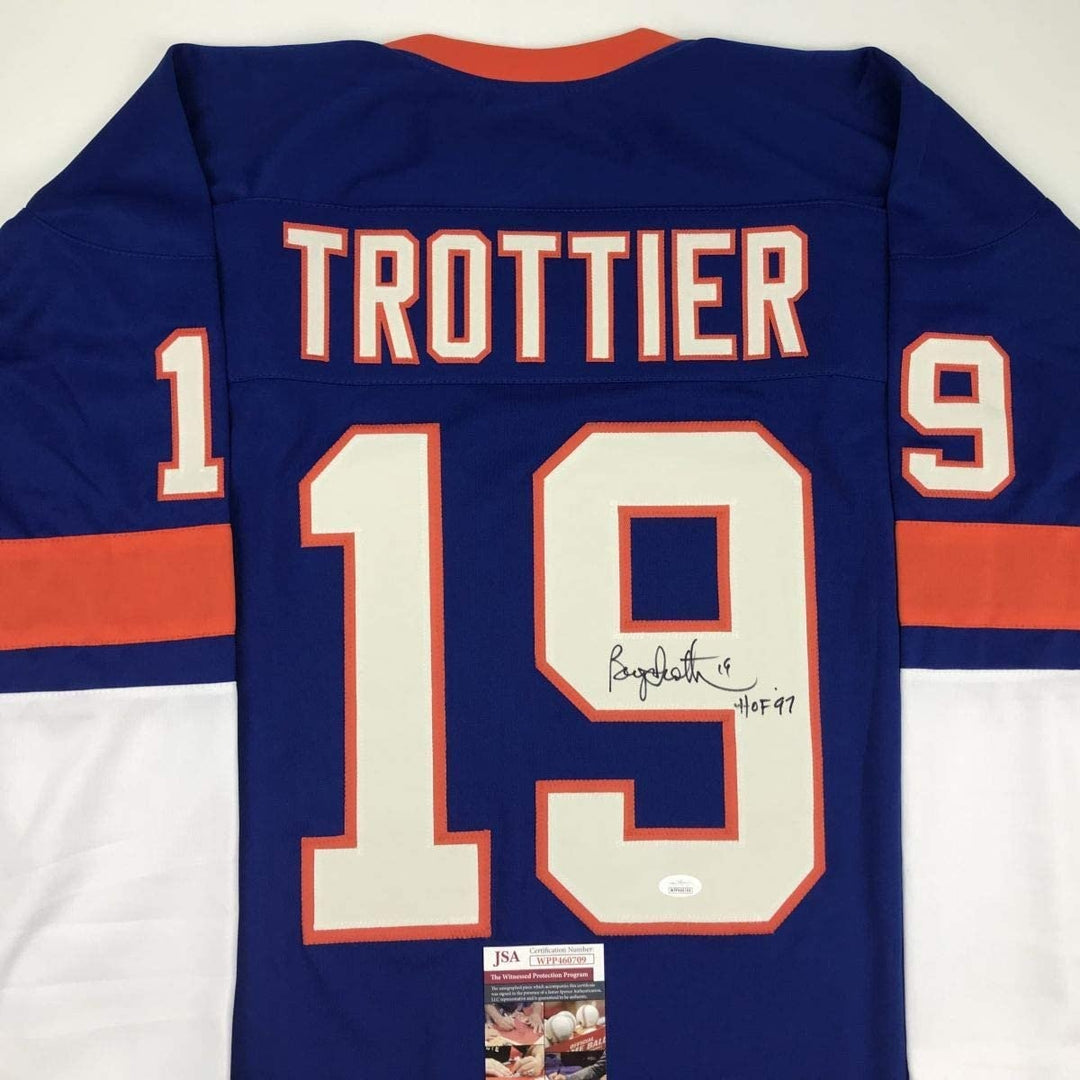 Autographed/Signed Bryan Trottier HOF 97 New York Blue Jersey JSA COA