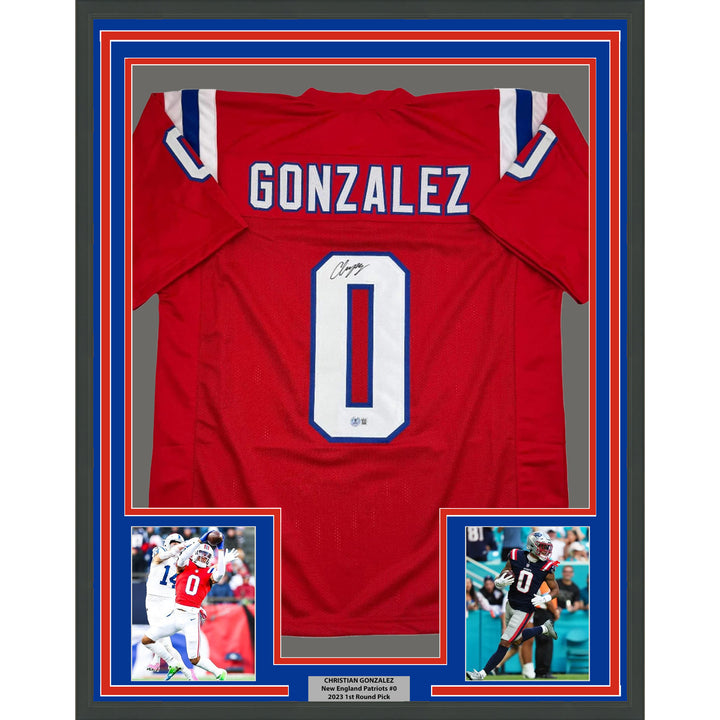 Framed Autographed/Signed Christian Gonzalez 35x39 NE Red Jersey Beckett BAS COA