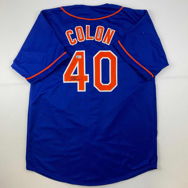 Autographed/Signed Bartolo Colon New York Blue Jersey Beckett BAS COA