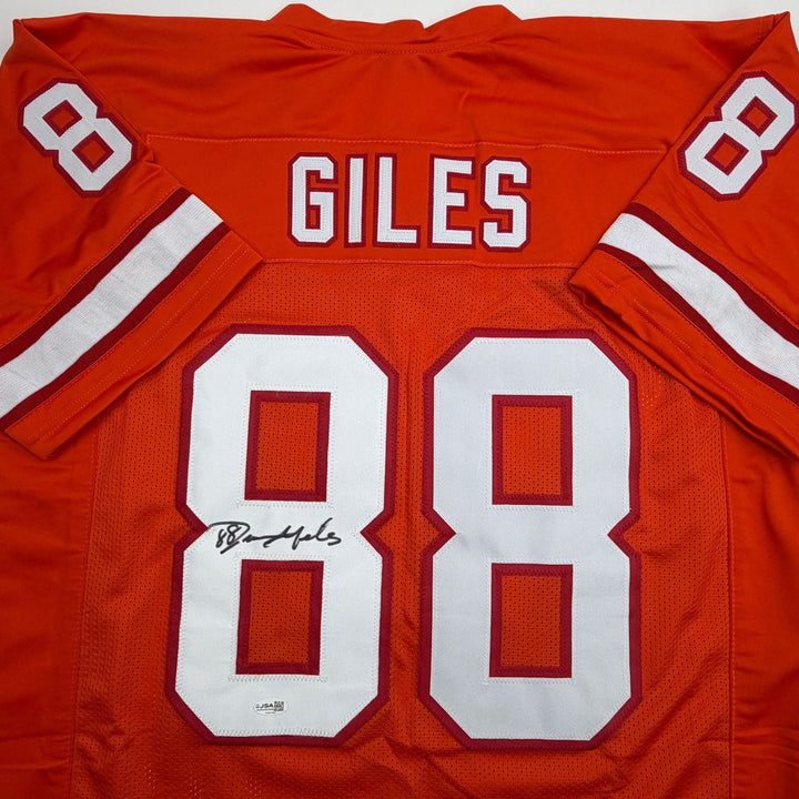 Autographed/Signed Jimmie Giles Tampa Bay Orange Football Jersey JSA COA