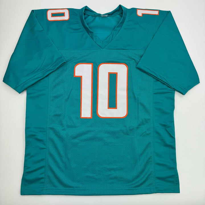 Autographed/Signed Tyreek Hill Miami Teal Football Jersey Beckett BAS COA