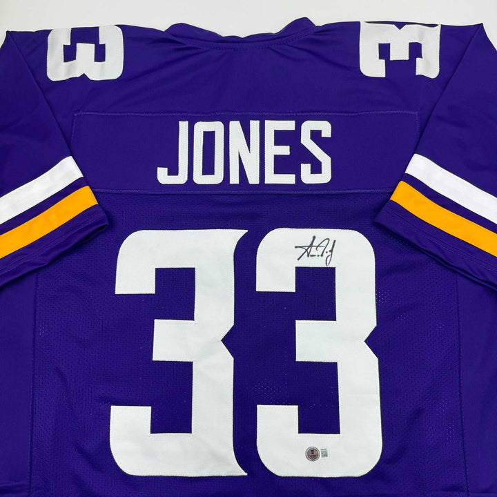Autographed/Signed Aaron Jones Minnesota Purple Jersey Beckett BAS COA