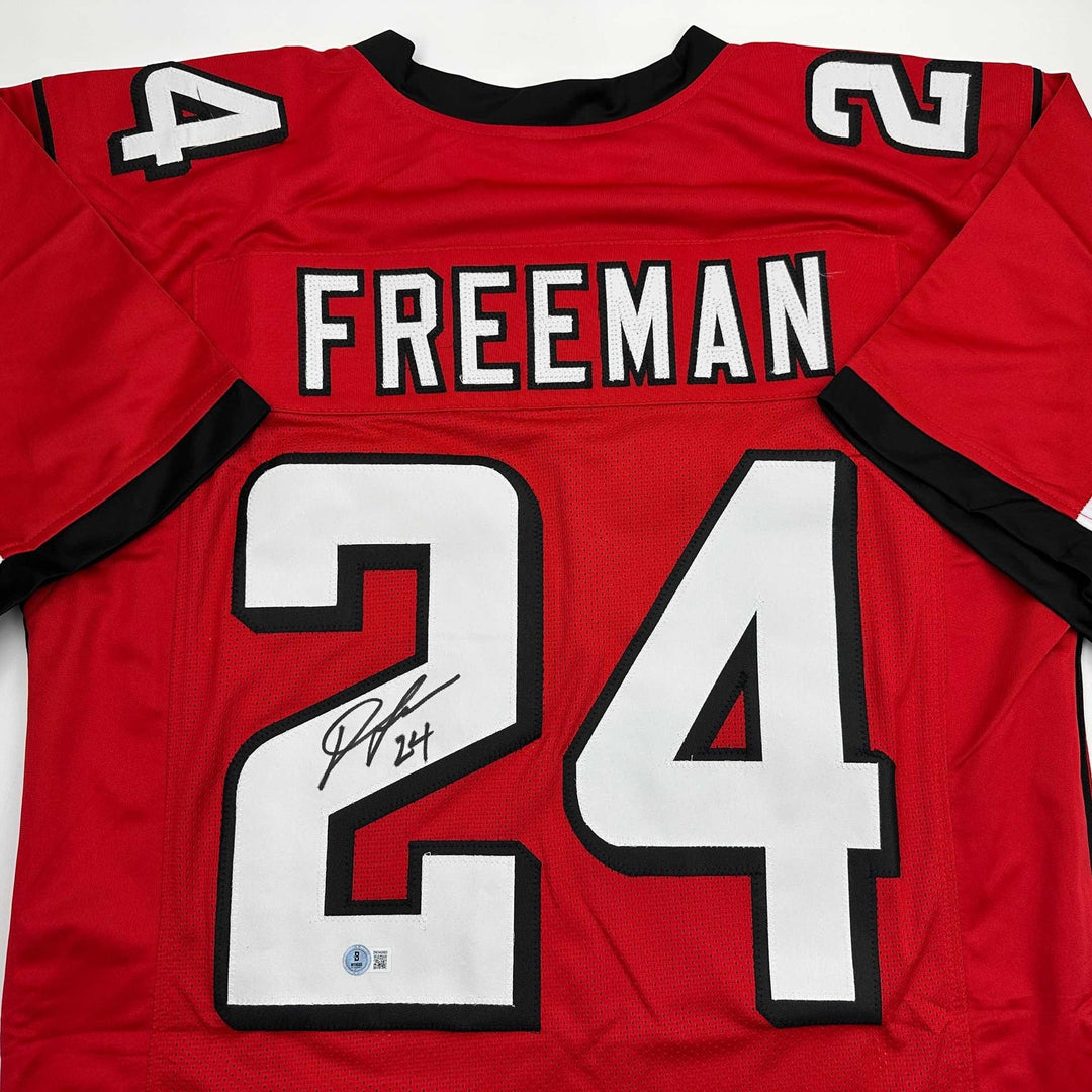 Autographed/Signed Devonta Freeman Atlanta Red Jersey Beckett BAS COA