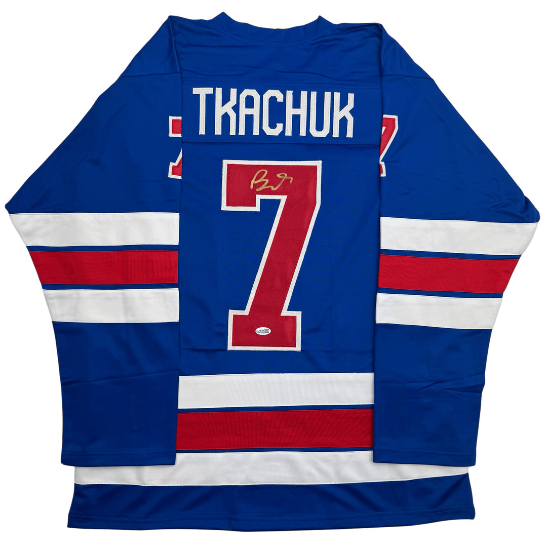 Autographed/Signed Brady Tkachuk USA 2026 Olympics Gold Blue Jersey JSA COA