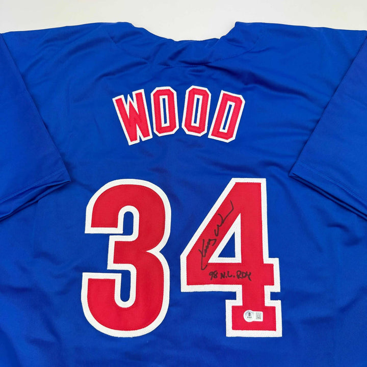 Autographed/Signed Kerry Wood 98 ROY Chicago Blue Jersey Beckett COA