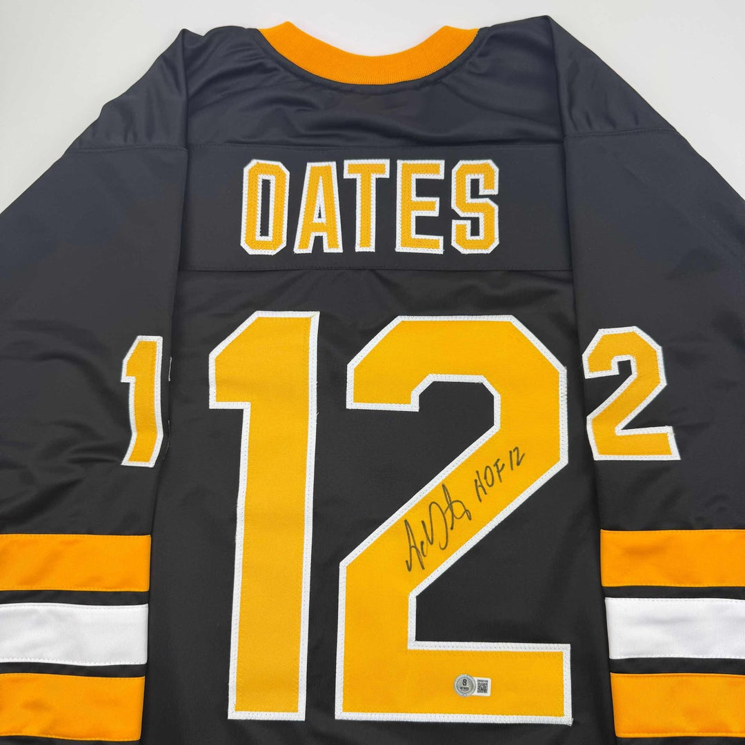 Autographed/Signed Adam Oates "HOF 12" Boston Black Jersey Beckett COA