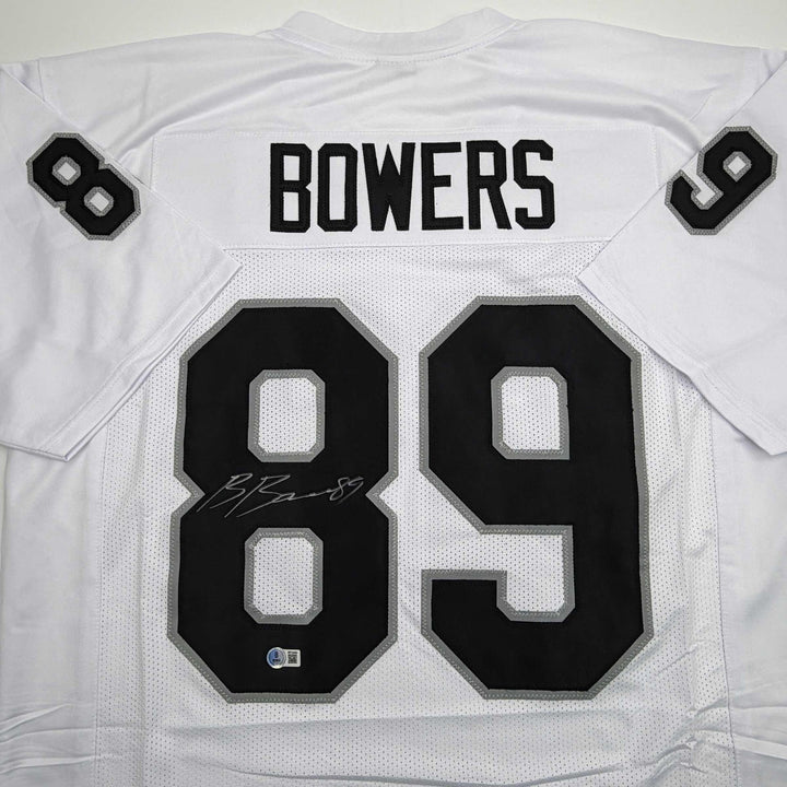Autographed/Signed Brock Bowers Las Vegas Oakland White Jersey Beckett BAS COA