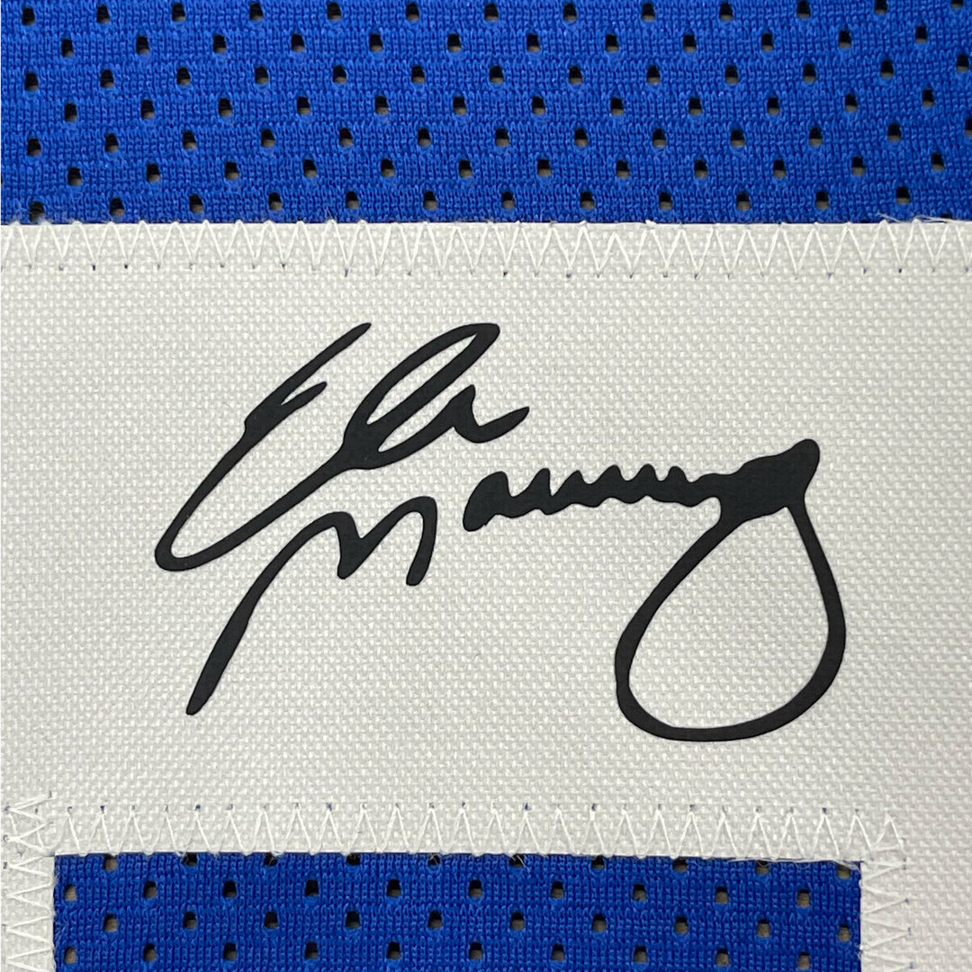 Framed Facsimile Autographed Eli Manning 33x42 NY Blue Reprint Laser Auto Jersey