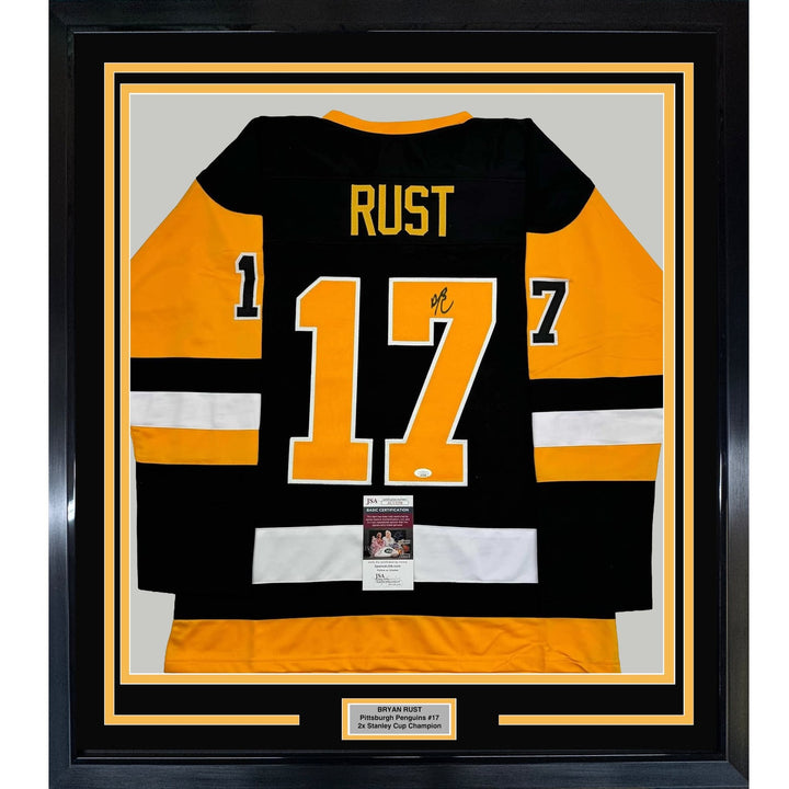 Framed Autographed/Signed Bryan Rust 35x39 Pittsburgh Black Jersey JSA COA