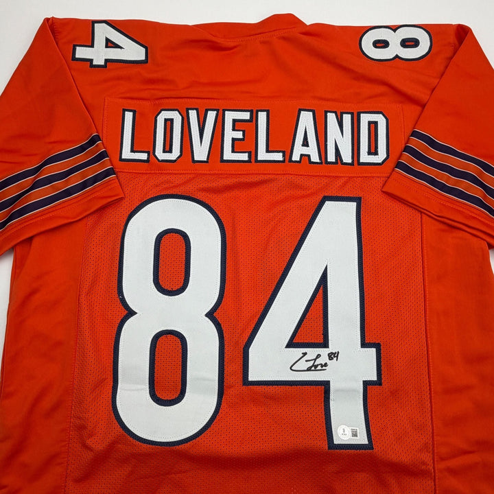 Autographed/Signed Colston Loveland Chicago Orange Football Jersey Beckett COA