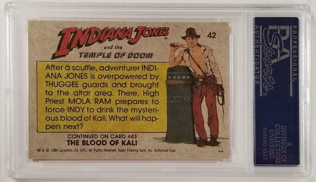 Jonathan Ke Quan signed 1984 Topps Indiana Jones #42 Indiana Captured Card ~ PSA