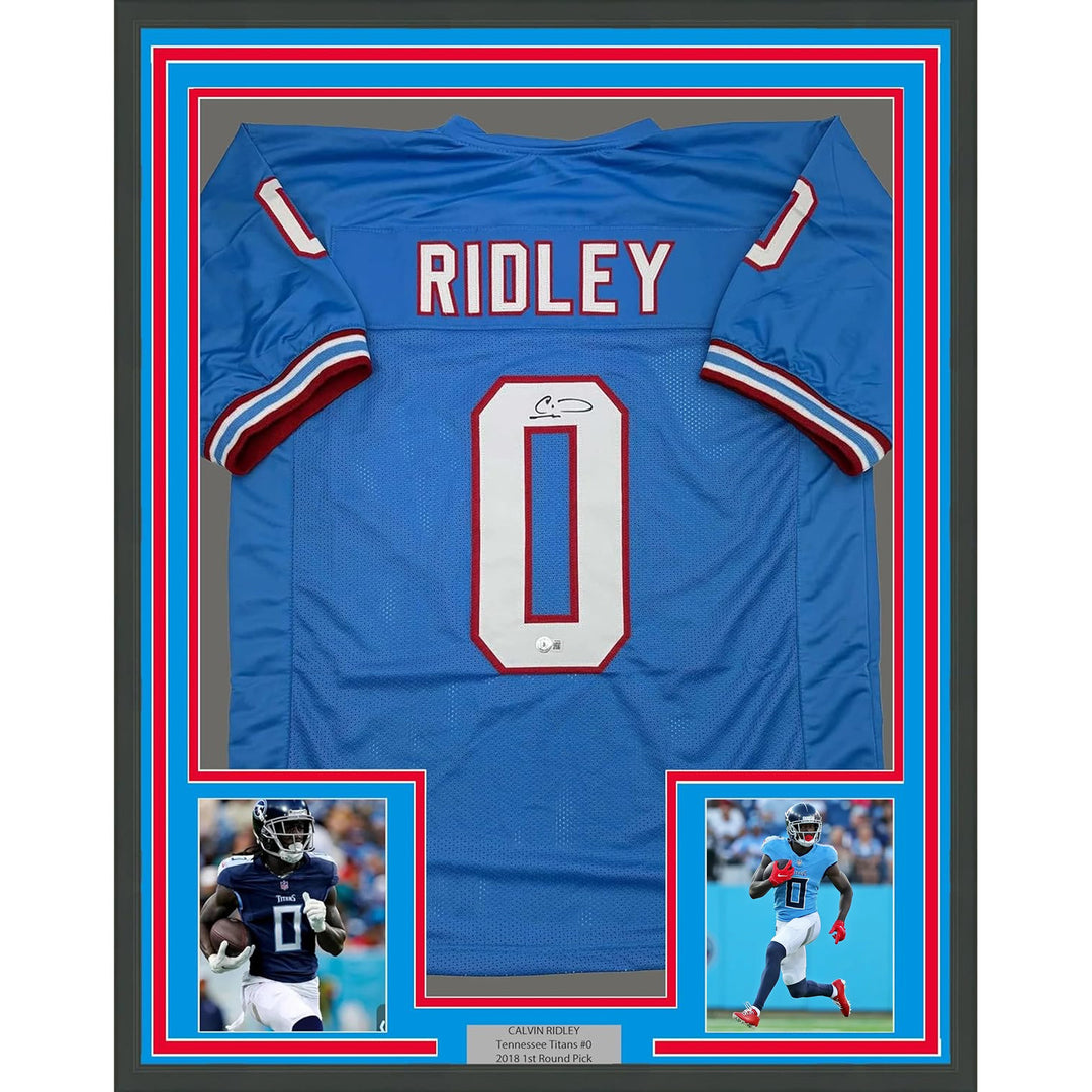 Framed Autographed/Signed Calvin Ridley 35x39 Tennessee Blue Jersey Beckett COA