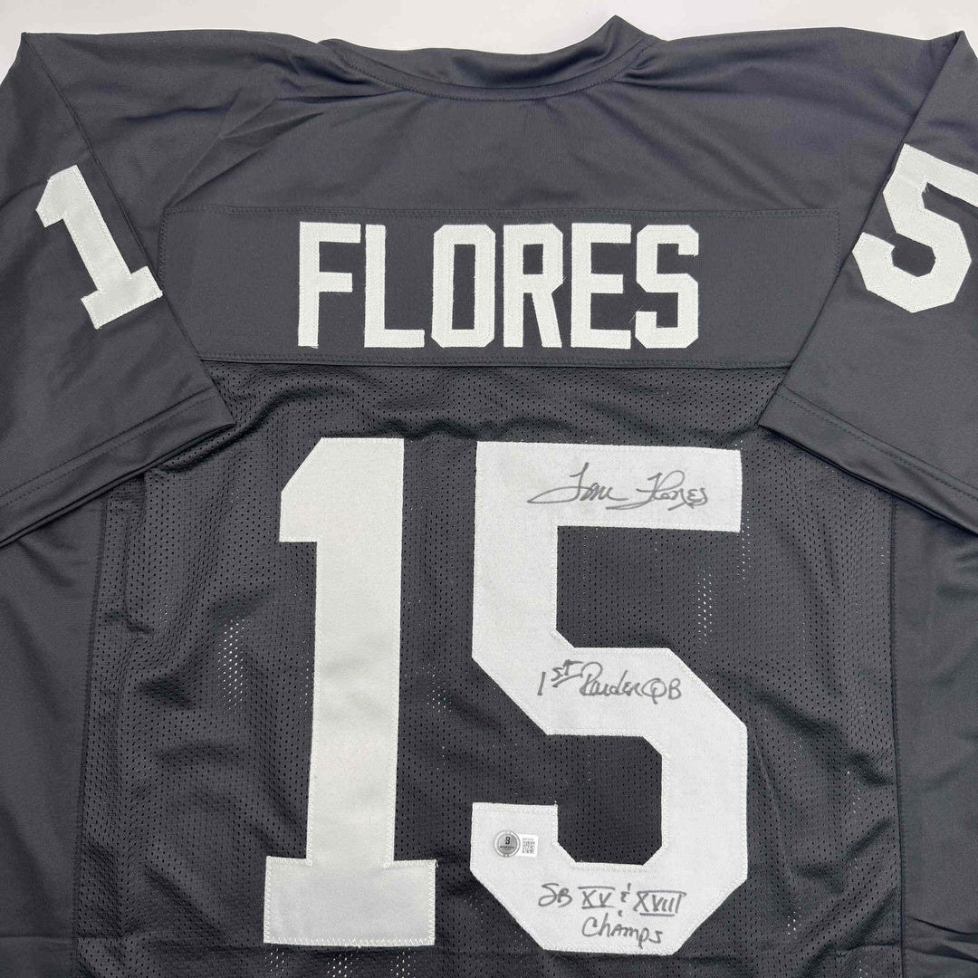 Autographed/Signed Tom Flores Las Vegas Oakland Black Jersey Beckett BAS COA