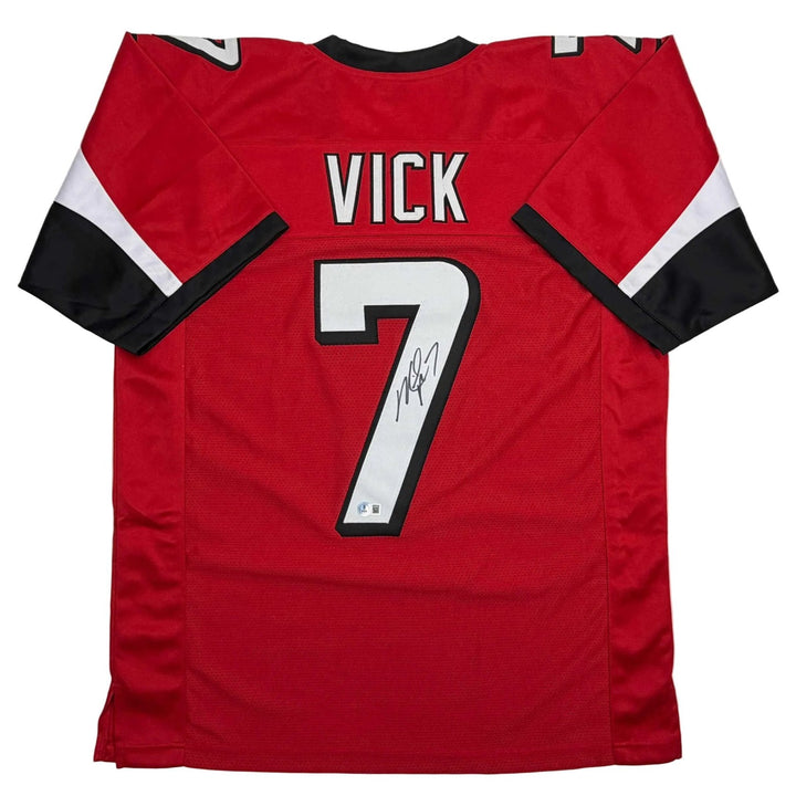 Autographed/Signed MICHAEL MIKE VICK Atlanta Red Jersey PSA/DNA COA