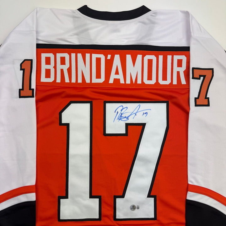 Autographed/Signed Rod Brind'Amour Philadelphia Orange Hockey Jersey Beckett COA