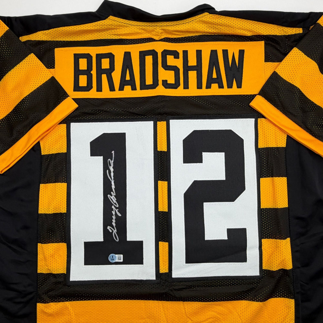 Autographed/Signed Terry Bradshaw Pittsburgh Bumble Bee Jersey Beckett COA