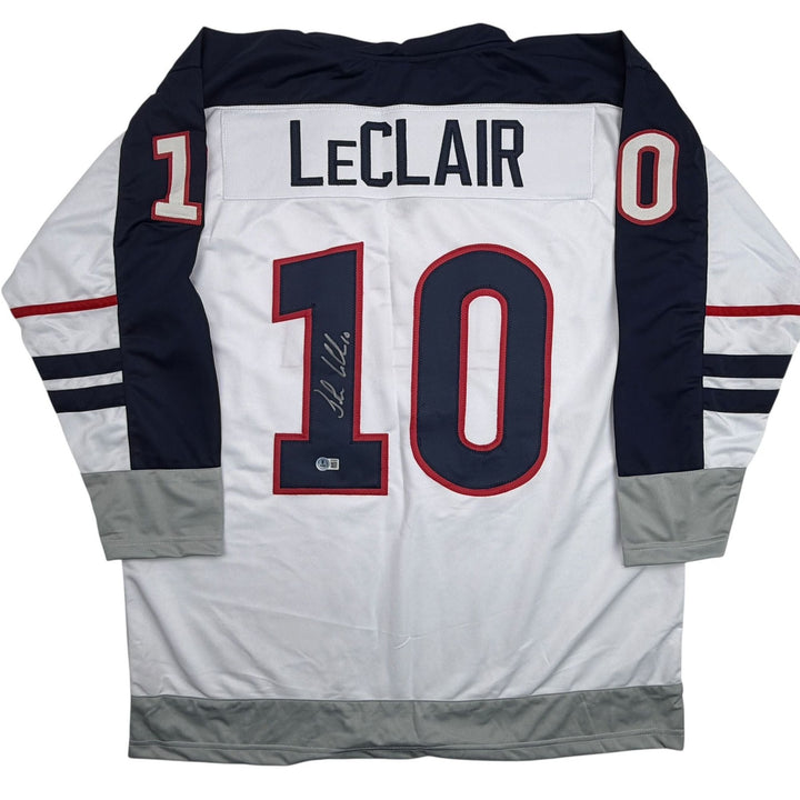 Autographed/Signed John LeClair United States USA White Jersey Beckett COA