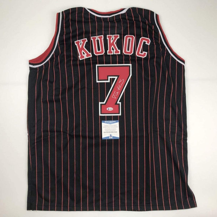 Autographed/Signed Toni Kukoc Chicago Black Pinstripe Jersey BAS COA