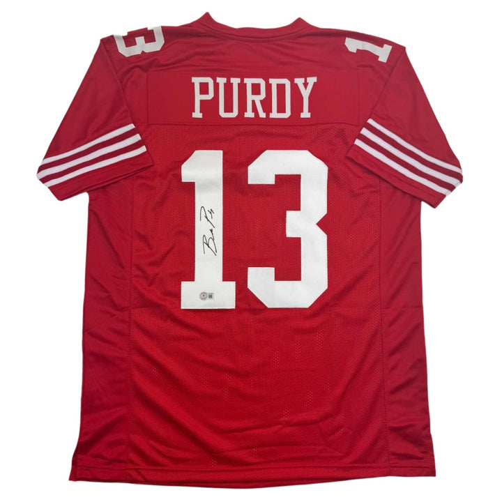 Autographed/Signed Brock Purdy San Francisco Red Jersey Beckett BAS COA