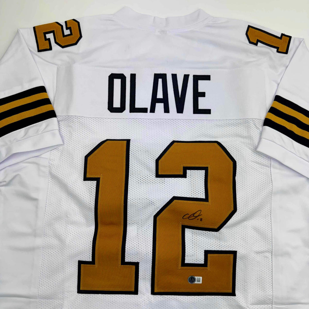 Autographed/Signed Chris Olave New Orleans Color Rush Jersey Beckett BAS COA