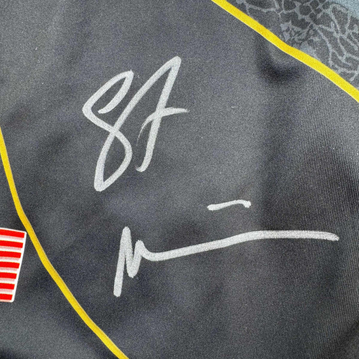 Autographed/Signed Stipe Miocic Black and Gold UFC MMA Trunks Shorts Beckett COA