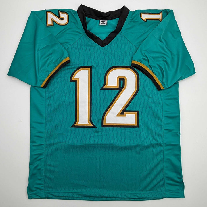 Autographed/Signed Travis Hunter Jacksonville Teal Retro Jersey Beckett COA