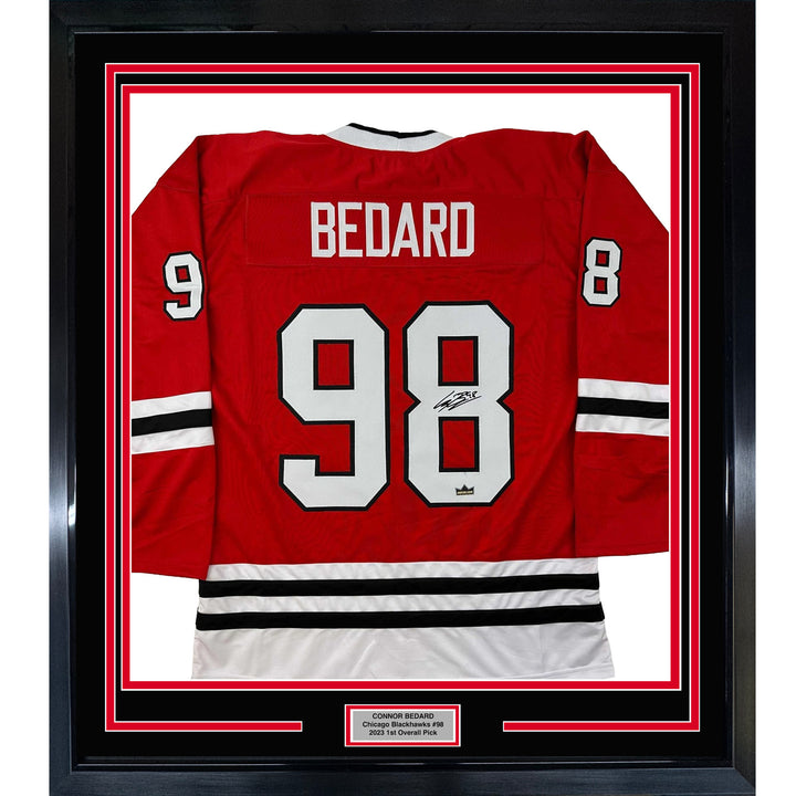 Framed Facsimile Autographed Connor Bedard 33x42 Red Reprint Laser Auto Jersey