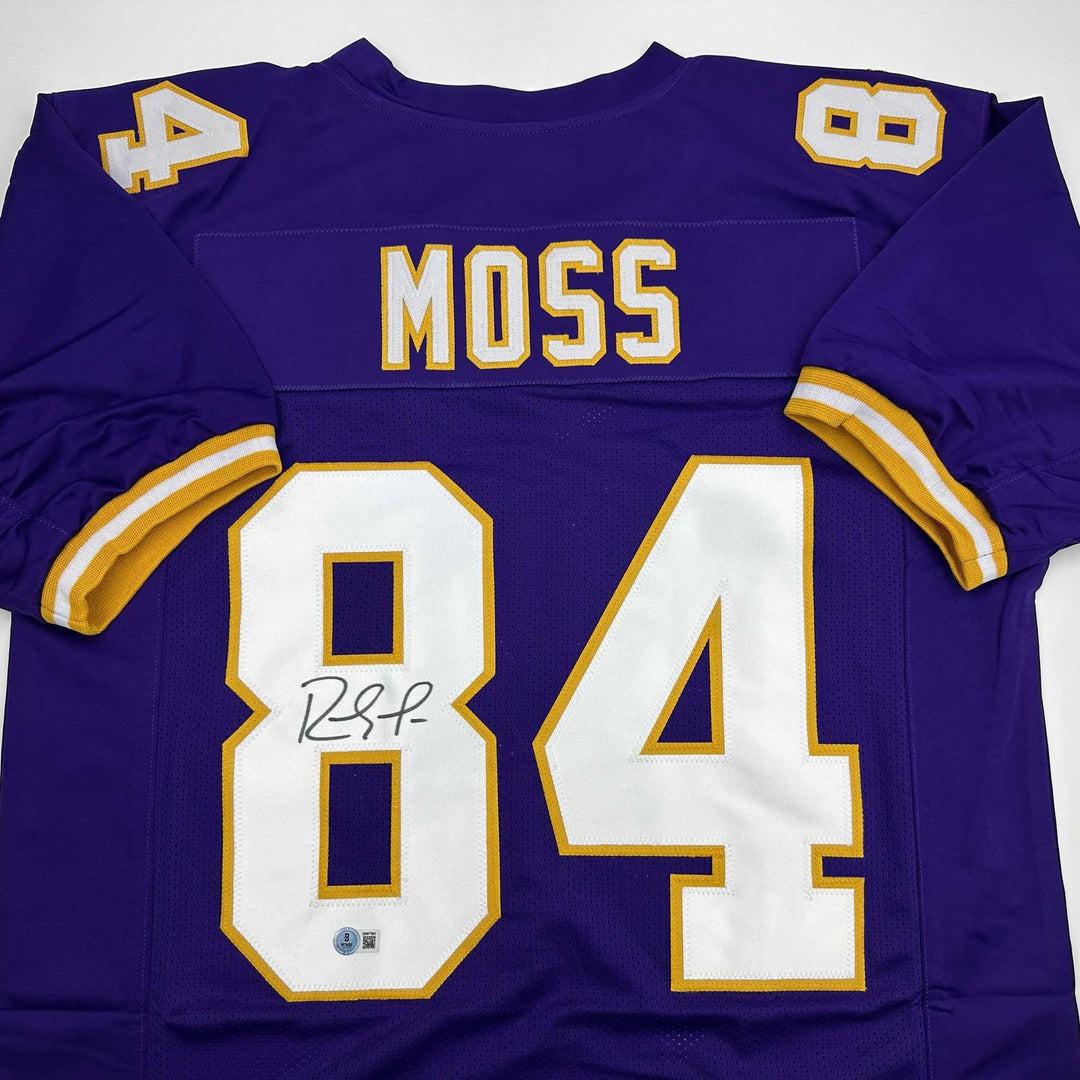 Autographed/Signed Randy Moss Minnesota Purple Football Jersey JSA COA