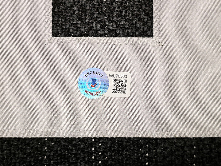 Oakland Raiders Marcus Allen Signed Black Jersey Beckett Witness