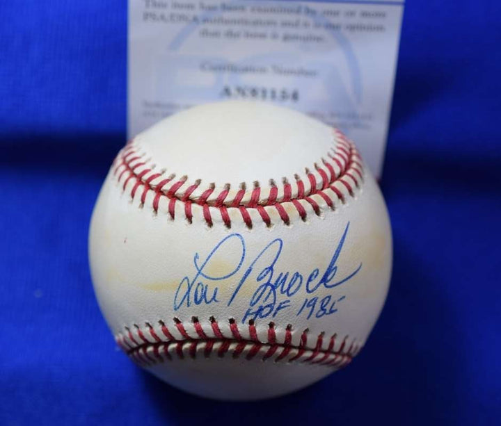 Lou Brock PSA DNA Autographed National League ONL Signed Baseball HOF 1985