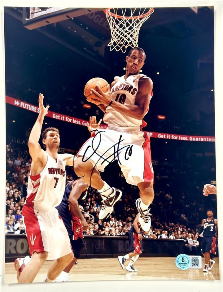 DeMar DeRozan signed Toronto Raptors 8.5x11 Photo autograph ~ BAS Beckett