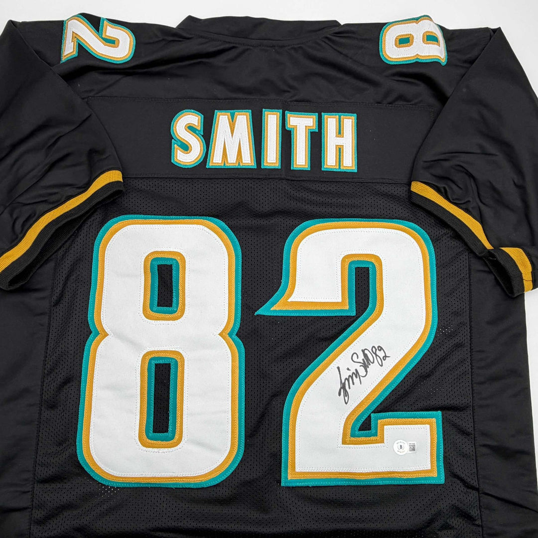 Autographed/Signed Jimmy Smith Jacksonville Black Football Jersey Beckett COA