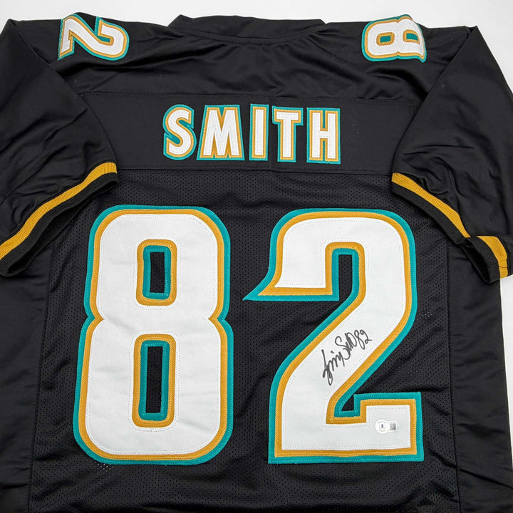 Autographed/Signed Jimmy Smith Jacksonville Black Football Jersey Beckett COA