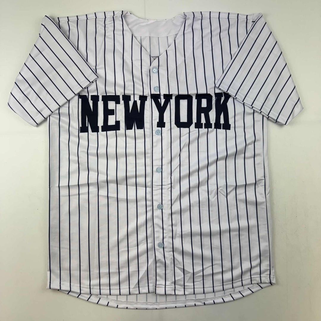 Autographed/Signed Mariano Rivera New York Pinstripe Jersey Beckett BAS COA